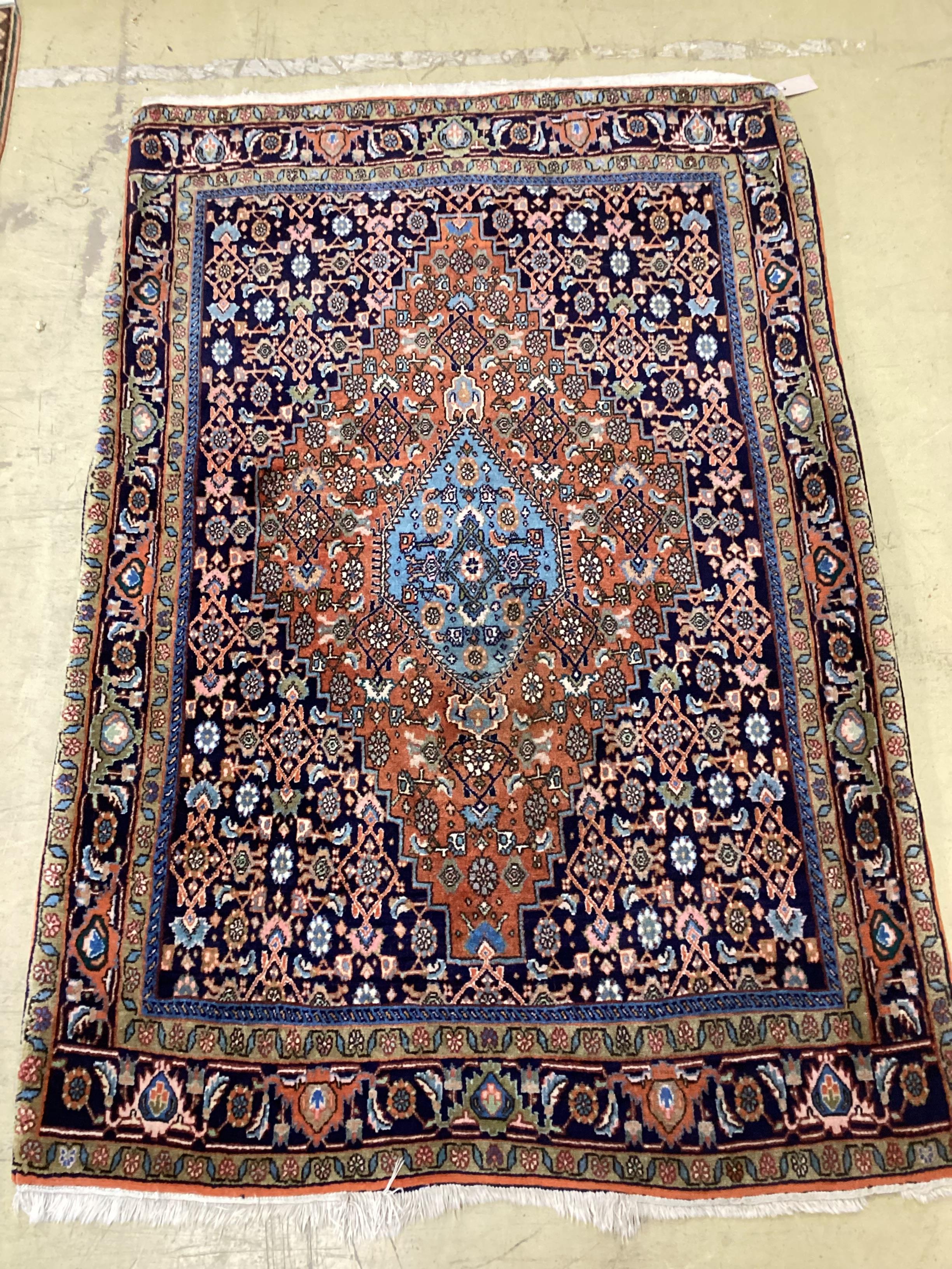 A Qashqai blue ground rug, 166 x 114cm